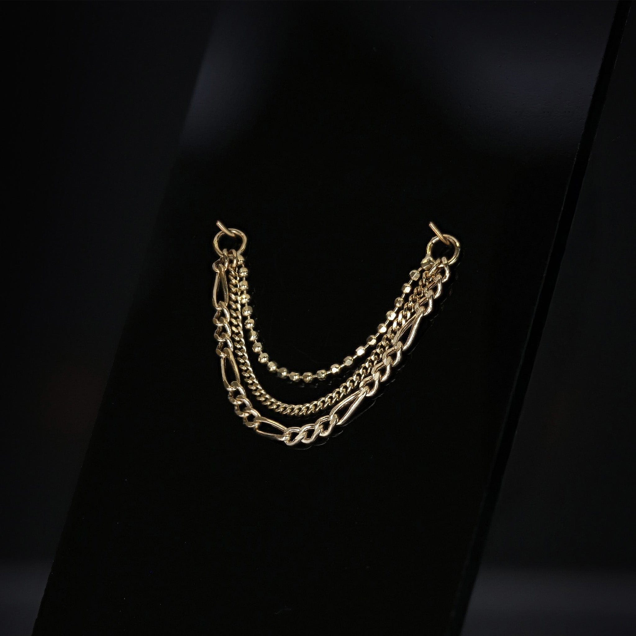 BEATTI 14K gold triple mixed chain attachment Quinn on black background