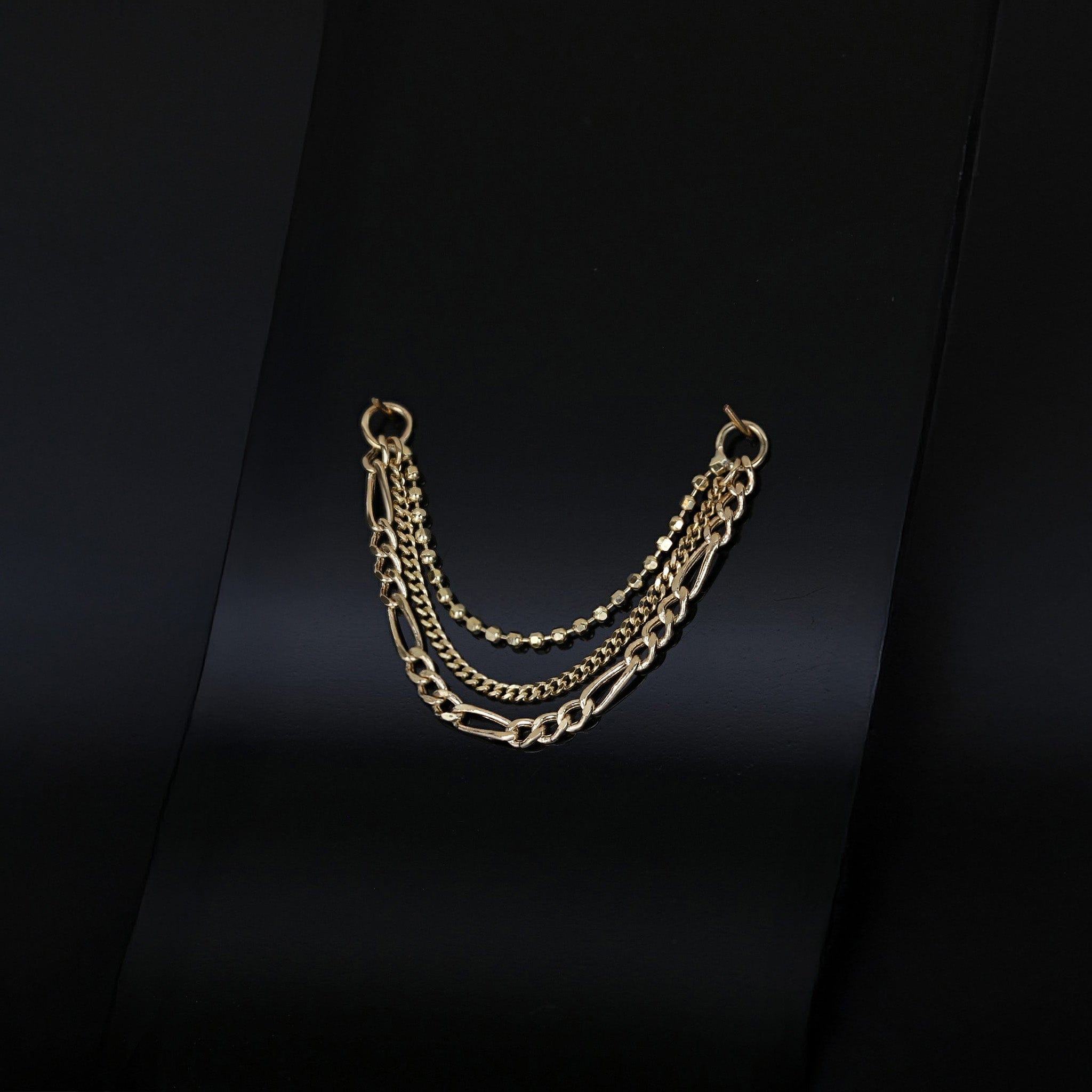 BEATTI 14K gold triple mixed chain attachment Quinn on black background