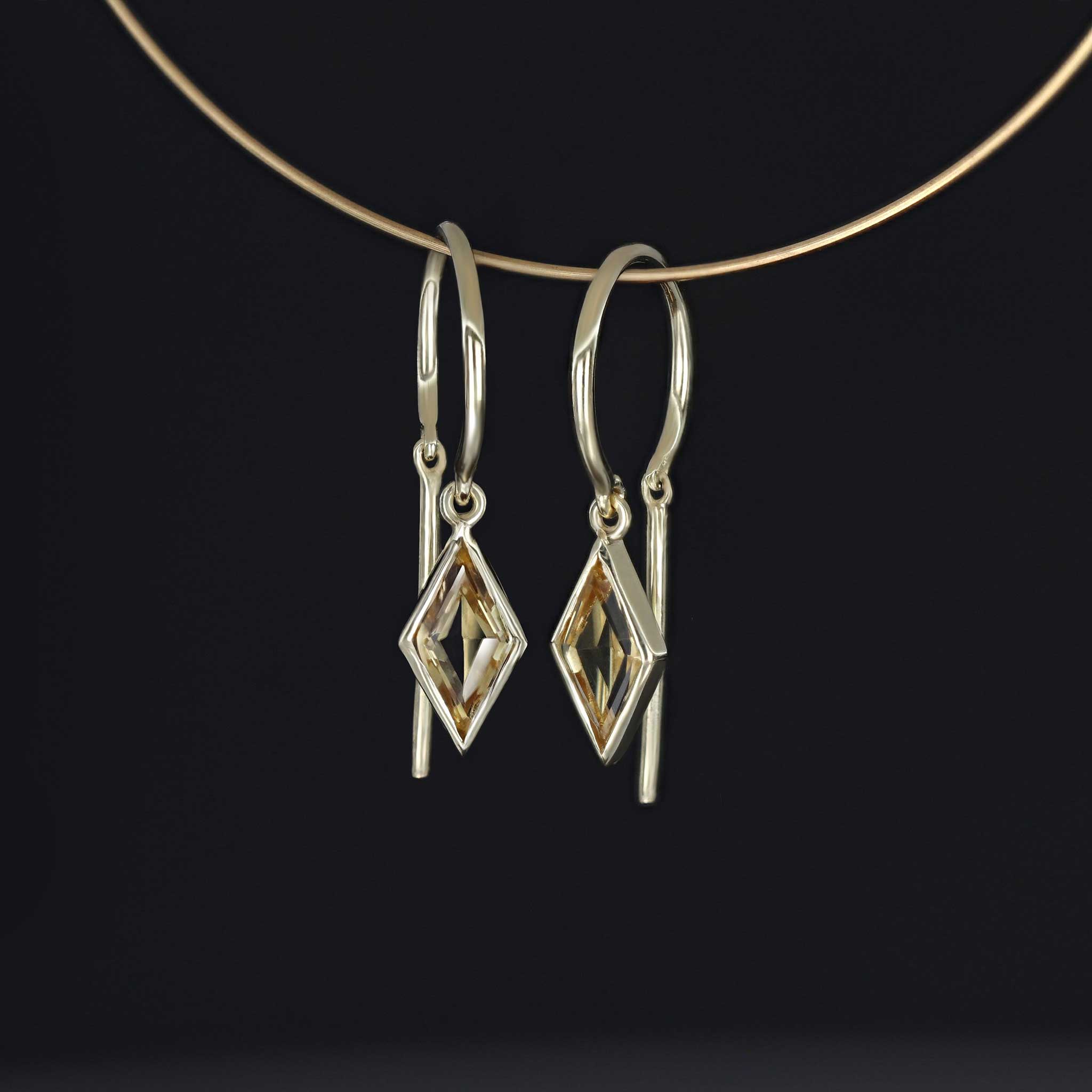 Ray open hoop earring with diamond cut citrine in bezel setting
