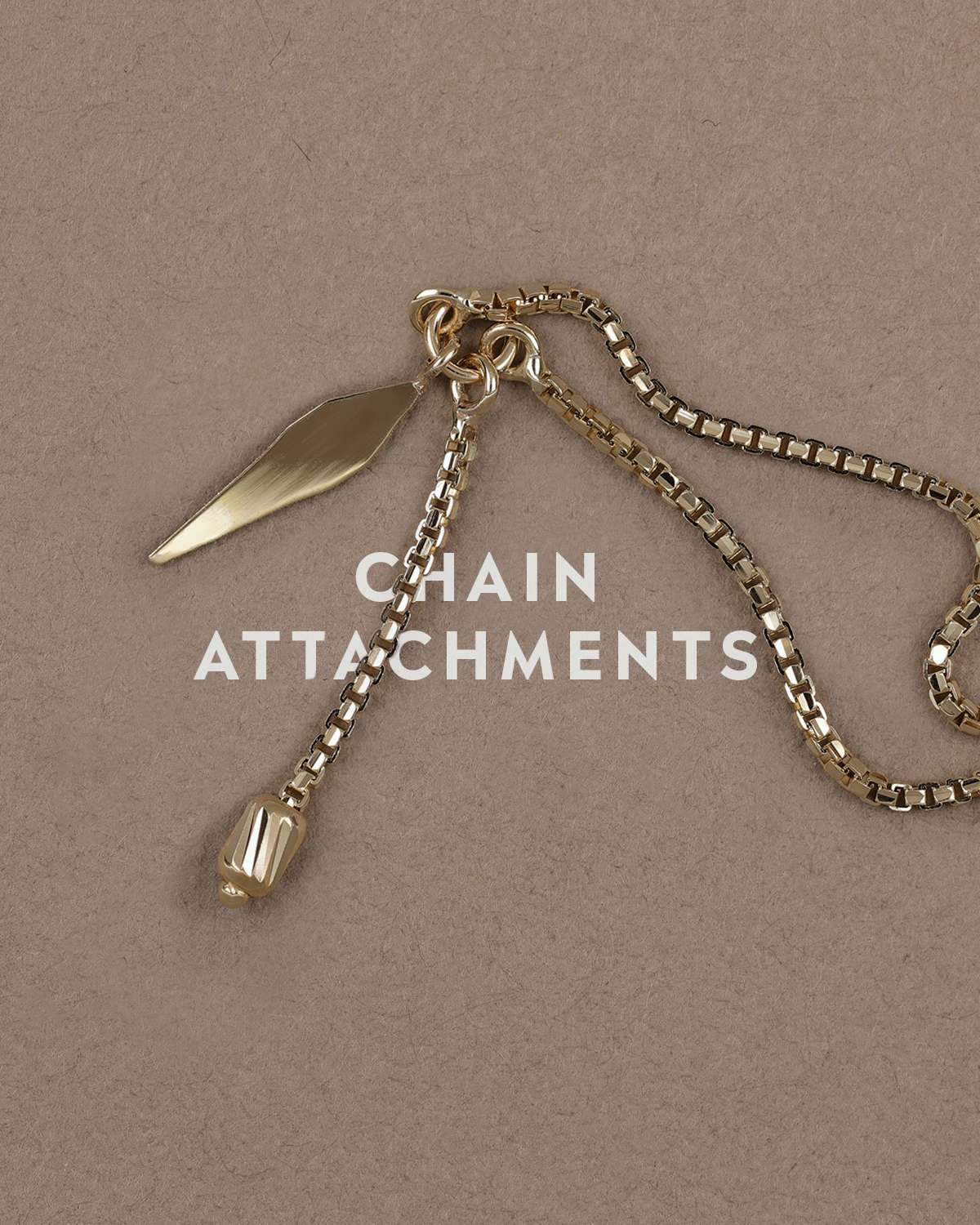 Gold brillcut spike chain attachment displayed on biege textured surface with the text CHAIN ATTACHMENTS in the middle