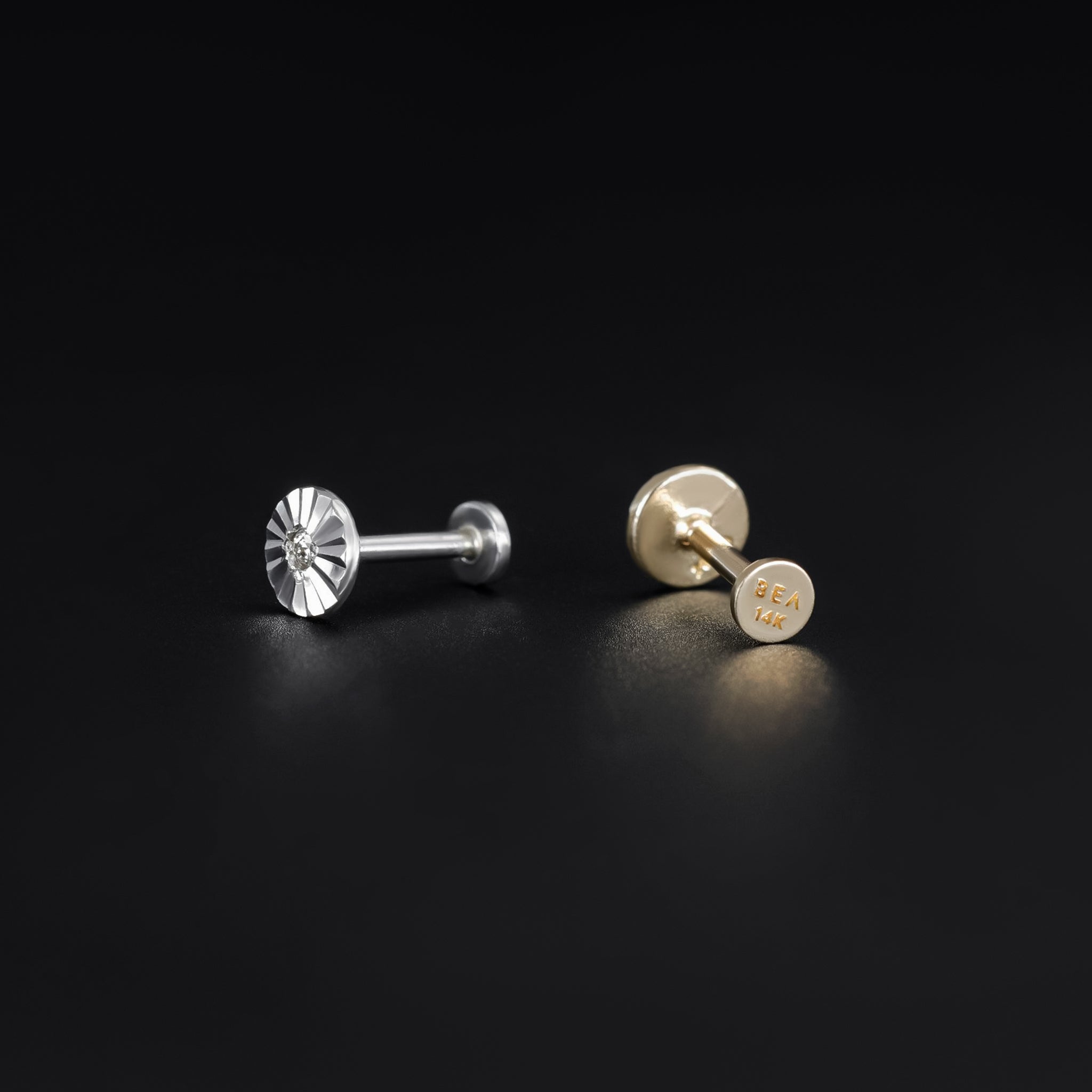 14k solid yellow gold flat disc studs with a diamond-cut pattern 