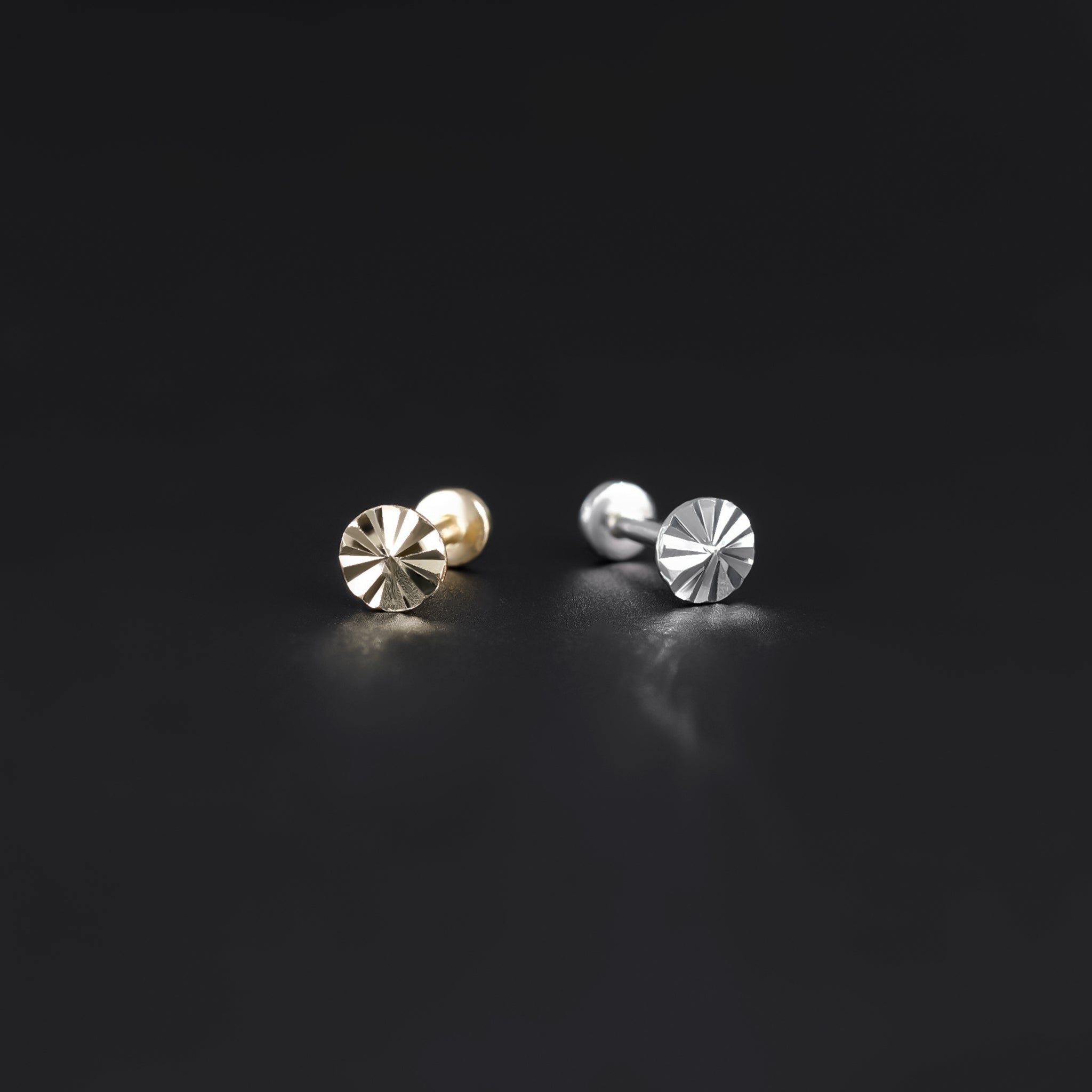 14K yellow and white gold studs with diamond-cut pattern on a flat round disc, 18G internally threaded design