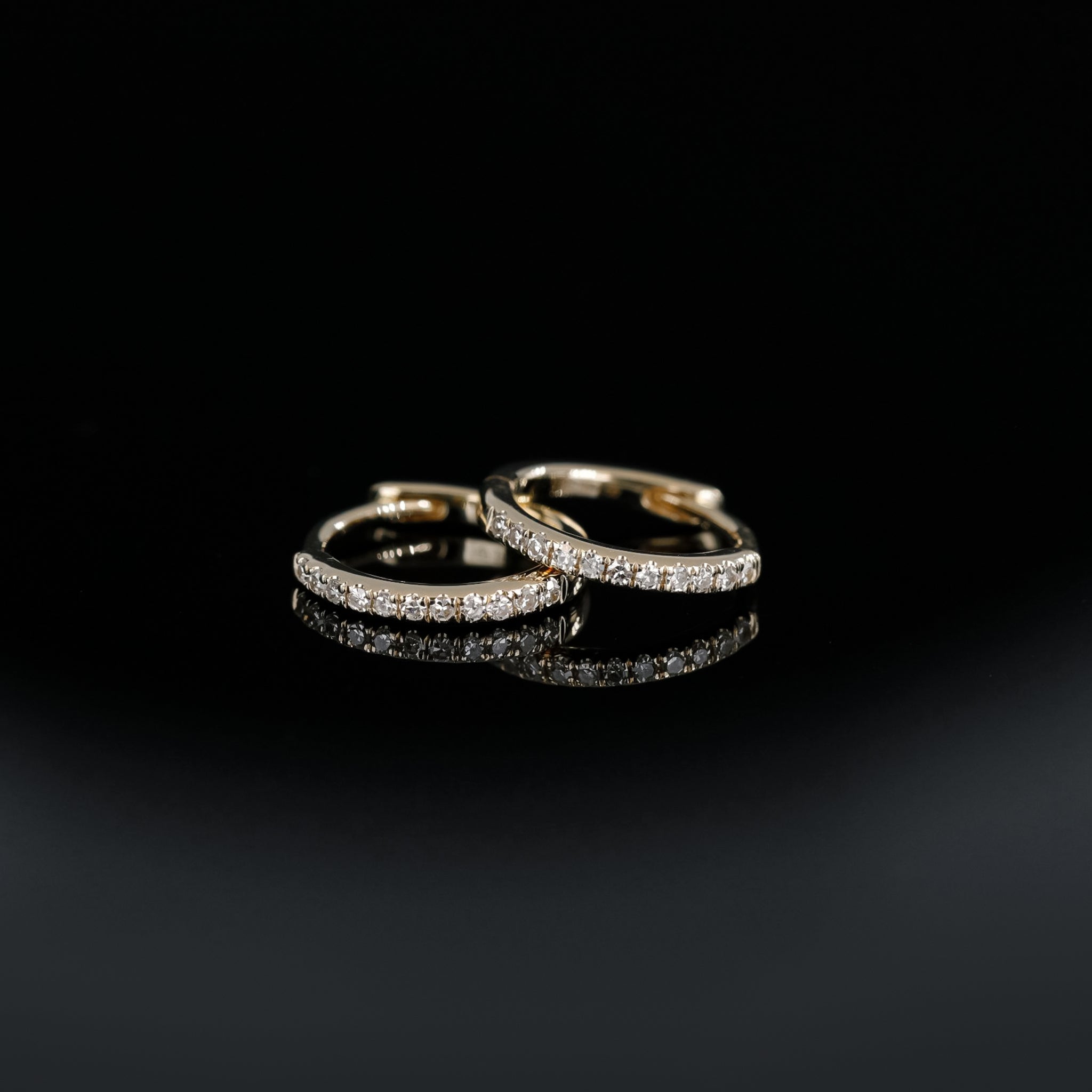 14K gold 10mm Diamond hoops in yellow gold stacked