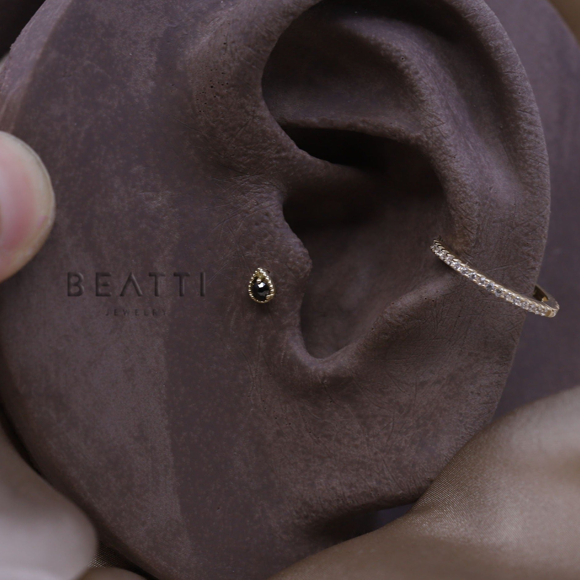 Internally threaded tragus on sale jewelry